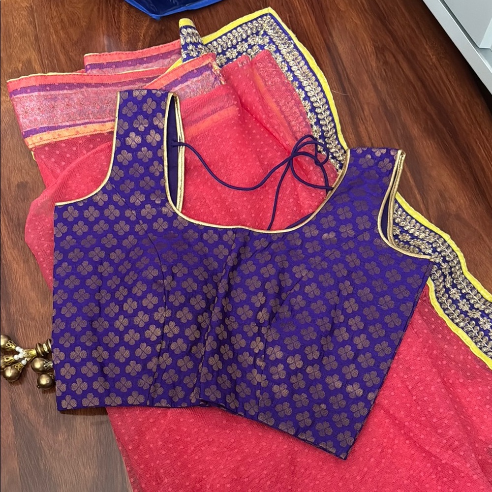 Purple blouse and pink saree